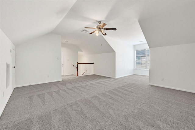 31 Hearthwick Rd, Tomball, TX 77375 - additional living space with vaulted ceiling, carpet flooring, and ceiling fan