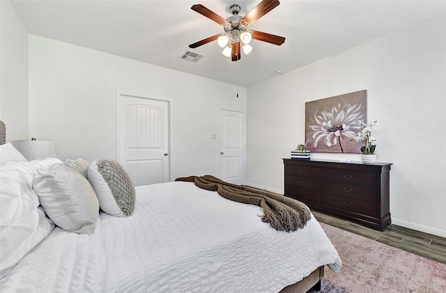 31 Hearthwick Rd, Tomball, TX 77375 - bedroom featuring wood finished floors and a ceiling fan