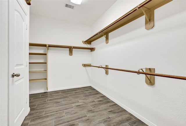 31 Hearthwick Rd, Tomball, TX 77375 - spacious closet featuring wood finished floors
