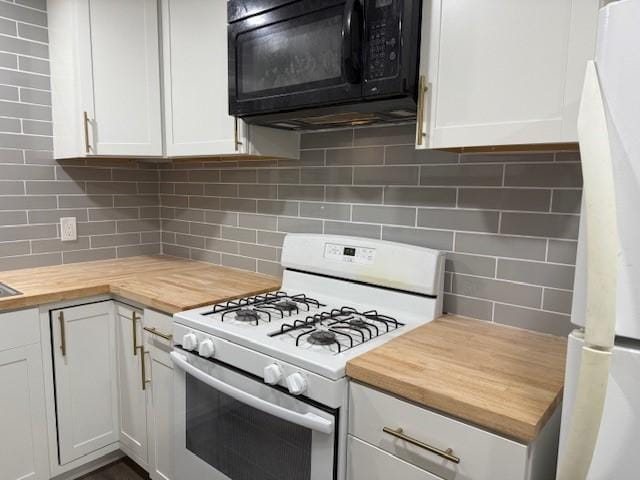 229 S Fulton St S, Texas City, TX 77591 - kitchen featuring butcher block countertops, black microwave, white range with gas cooktop, white cabinets, and refrigerator