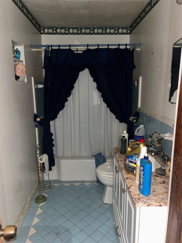 4906 Meadow Park Dr, Houston, TX 77048 - bathroom featuring shower / tub combo with curtain, tile patterned flooring, and vanity