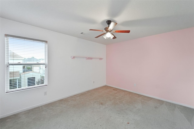 8011 Sumal Cir, Baytown, TX 77521 - spare room featuring ceiling fan and light colored carpet