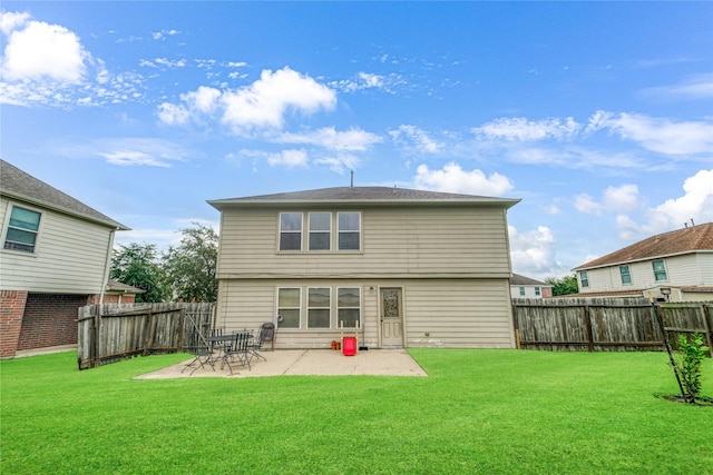 8011 Sumal Cir, Baytown, TX 77521 - back of house with a fenced backyard and a patio