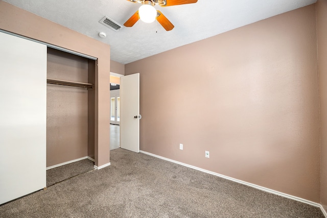 12226 Westwold Dr, Tomball, TX 77377 - unfurnished bedroom featuring carpet flooring, a closet, and a ceiling fan