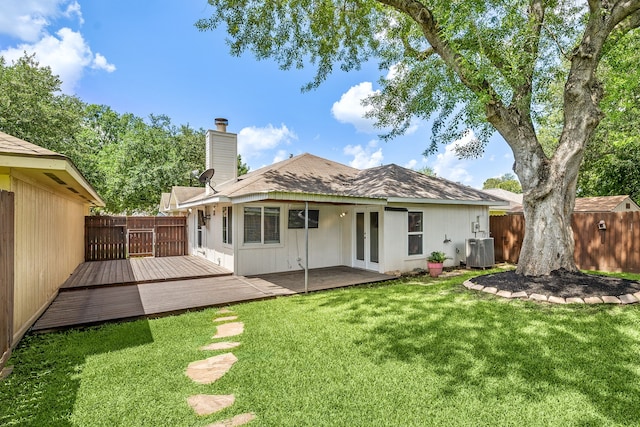12226 Westwold Dr, Tomball, TX 77377 - rear view of property featuring french doors, a chimney, and a wooden deck
