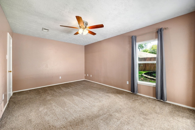 12226 Westwold Dr, Tomball, TX 77377 - carpeted empty room with a ceiling fan and a textured ceiling