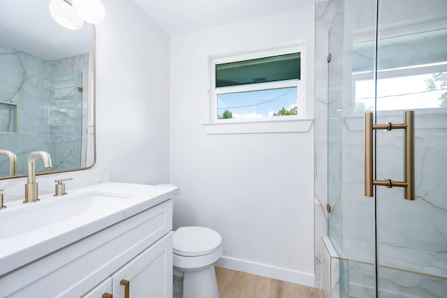 5730 Alvarado Dr, Houston, TX 77035 - full bath with a marble finish shower, vanity, and healthy amount of natural light