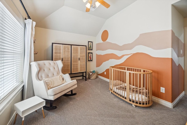 1219 Hickory St, Houston, TX 77007 - carpeted bedroom featuring vaulted ceiling, multiple windows, and ceiling fan