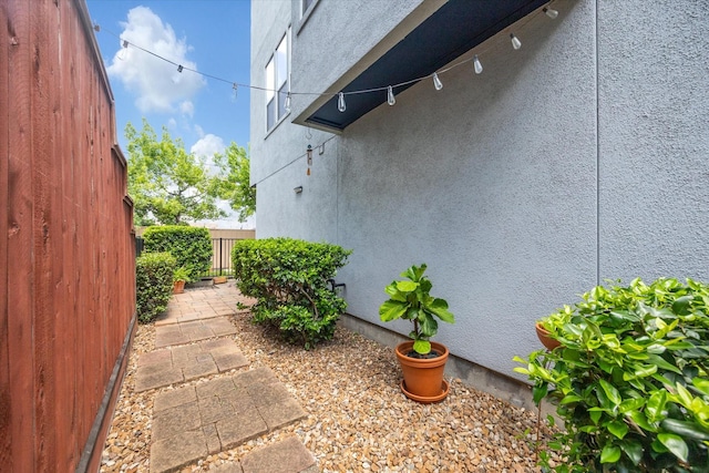 1219 Hickory St, Houston, TX 77007 - view of property exterior featuring stucco siding