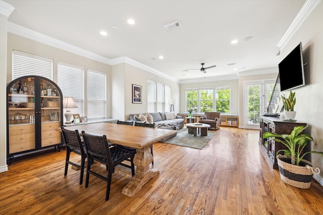 1219 Hickory St, Houston, TX 77007 - dining area with wood finished floors, recessed lighting, a ceiling fan, and ornamental molding