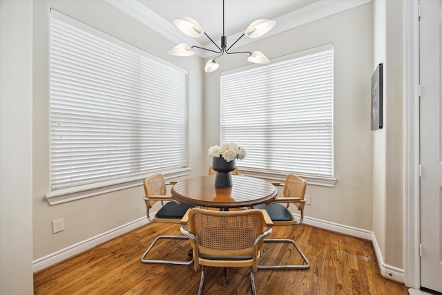 1219 Hickory St, Houston, TX 77007 - dining space with a chandelier and wood finished floors