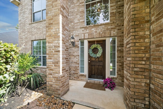 15 Sheltered Arbor Ct, The Woodlands, TX 77382 - property entrance with brick siding