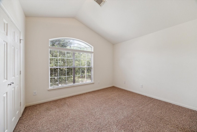 15 Sheltered Arbor Ct, The Woodlands, TX 77382 - unfurnished bedroom with carpet flooring and vaulted ceiling
