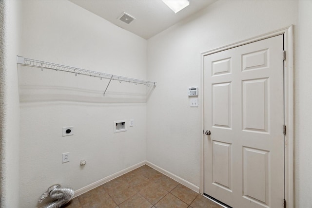 15 Sheltered Arbor Ct, The Woodlands, TX 77382 - washroom with hookup for an electric dryer, washer hookup, hookup for a gas dryer, and light tile patterned flooring