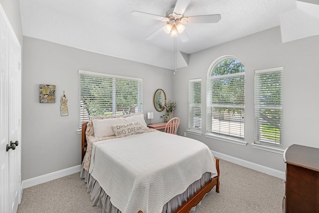8639 Ballinger Dr, Houston, TX 77064 - bedroom with light colored carpet and a ceiling fan
