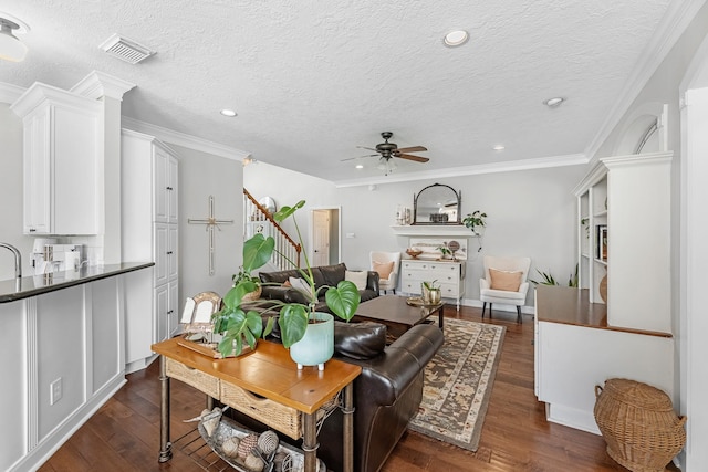 8639 Ballinger Dr, Houston, TX 77064 - living room featuring stairs, ceiling fan, a textured ceiling, dark wood finished floors, and recessed lighting