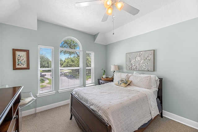 8639 Ballinger Dr, Houston, TX 77064 - carpeted bedroom with a textured ceiling and a ceiling fan