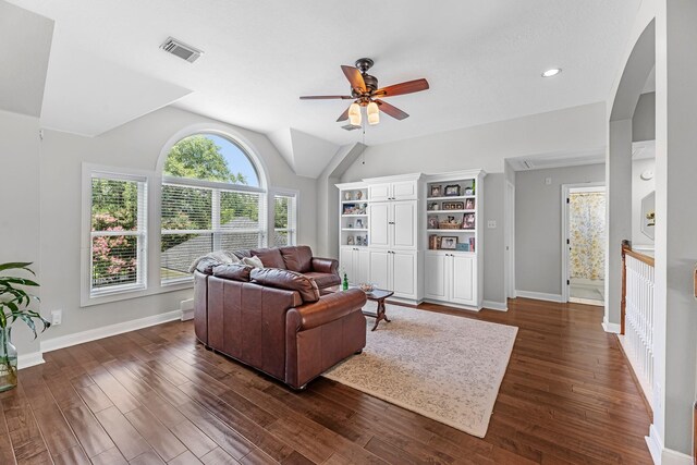 8639 Ballinger Dr, Houston, TX 77064 - living area featuring ceiling fan, dark wood-type flooring, lofted ceiling, and attic access