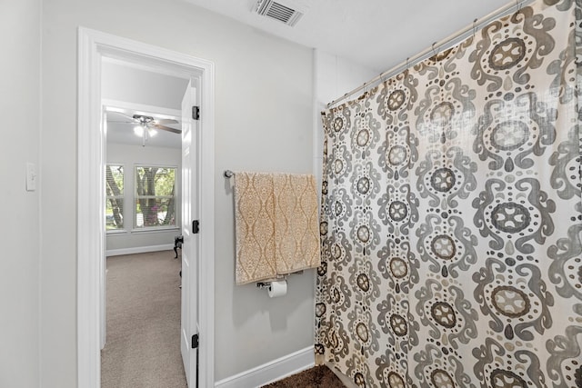 8639 Ballinger Dr, Houston, TX 77064 - full bath with ceiling fan and a shower with curtain