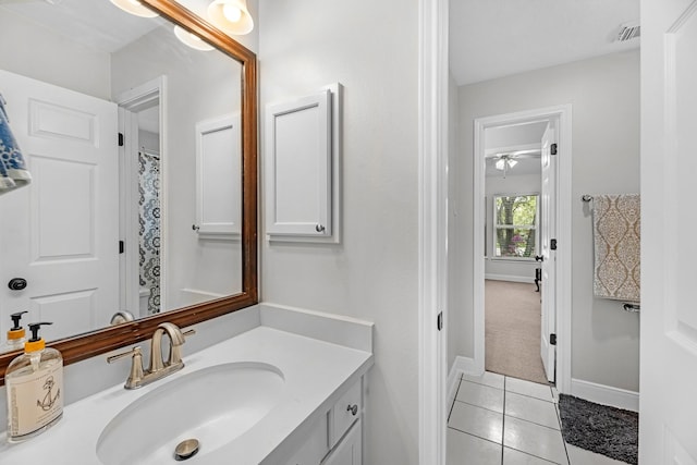 8639 Ballinger Dr, Houston, TX 77064 - bathroom featuring vanity, tile patterned floors, and ceiling fan