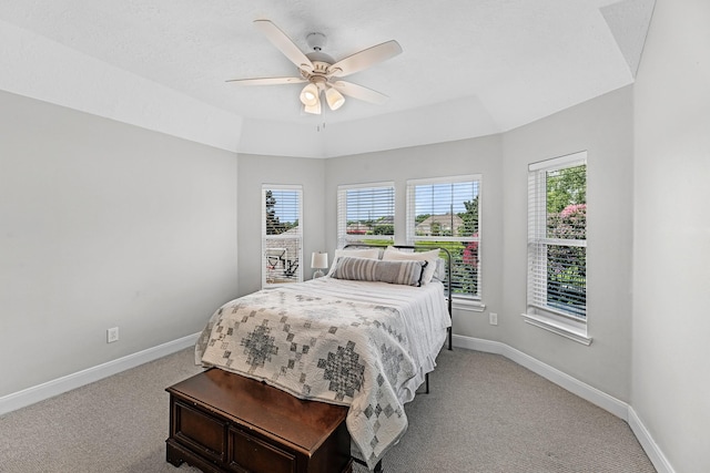 8639 Ballinger Dr, Houston, TX 77064 - bedroom featuring light carpet, multiple windows, and ceiling fan