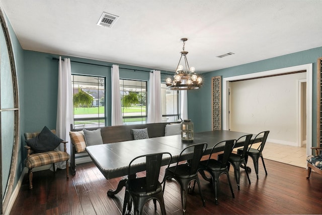 1025 Creek Bnd, Jasper, TX 75951 - dining space featuring a chandelier and dark wood-style flooring