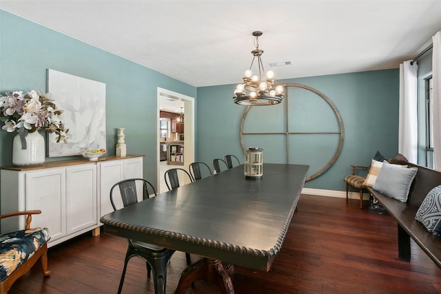 1025 Creek Bnd, Jasper, TX 75951 - dining room with a chandelier, dark wood finished floors, and plenty of natural light