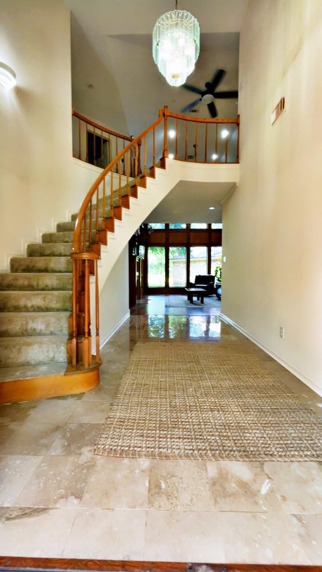 1600 Azalea St, Sweeny, TX 77480 - entryway featuring a towering ceiling, stairway, and a chandelier