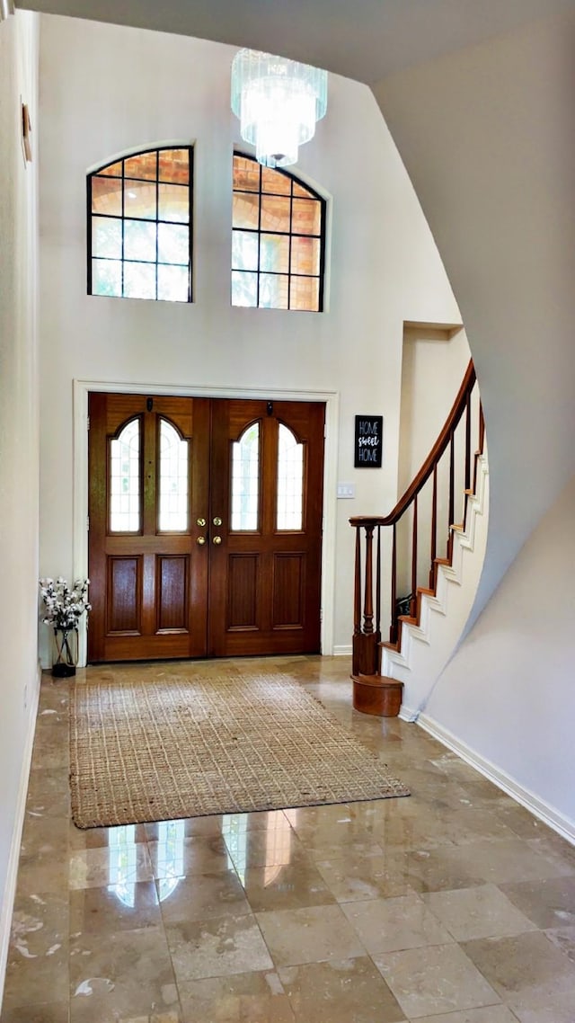 1600 Azalea St, Sweeny, TX 77480 - entryway with a towering ceiling, marble tiled floors, and stairs