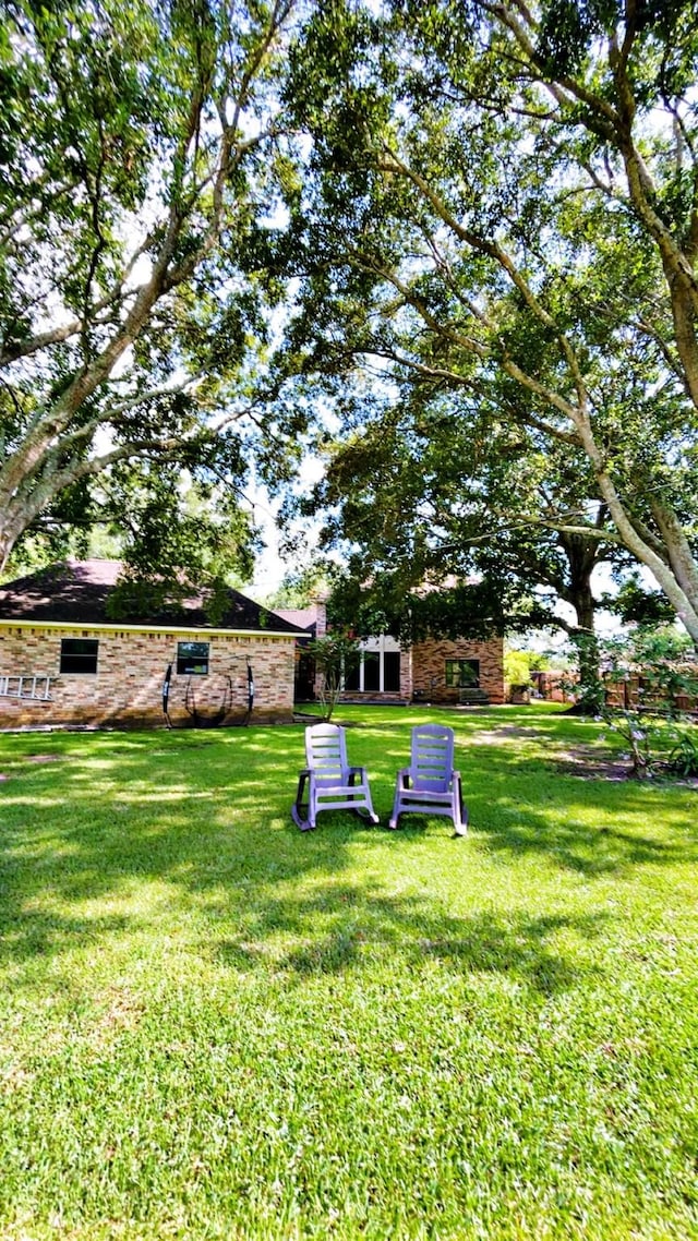 1600 Azalea St, Sweeny, TX 77480 - view of green lawn
