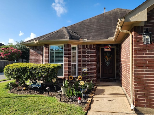 3514 Tulip Trace Dr, Spring, TX 77386 - property entrance featuring brick siding and roof with shingles