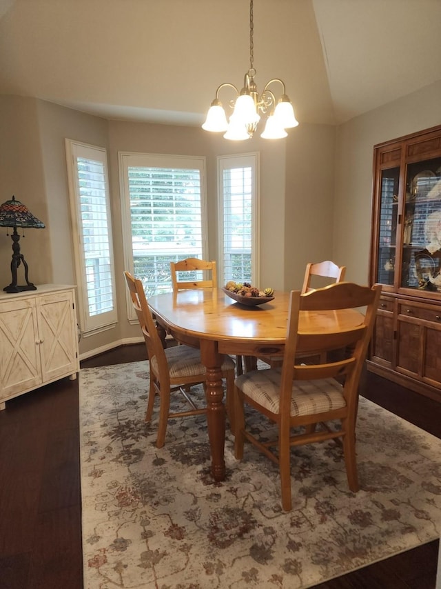 3514 Tulip Trace Dr, Spring, TX 77386 - dining room featuring a chandelier, lofted ceiling, and dark wood finished floors