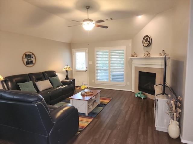 3514 Tulip Trace Dr, Spring, TX 77386 - living room featuring a ceiling fan, dark wood-type flooring, a tile fireplace, and lofted ceiling