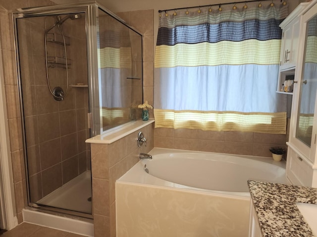 3514 Tulip Trace Dr, Spring, TX 77386 - full bathroom featuring a shower stall, a bath, and vanity