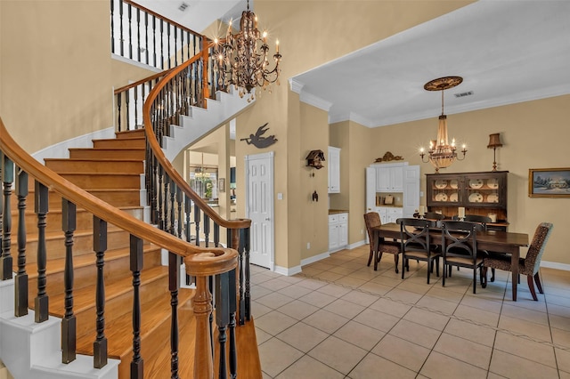 1019 Towering Oaks St, Magnolia, TX 77355 - dining space featuring a chandelier, light tile patterned floors, crown molding, stairs, and a high ceiling