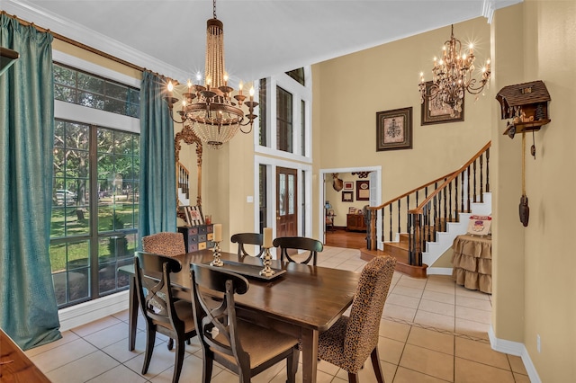 1019 Towering Oaks St, Magnolia, TX 77355 - dining room featuring a chandelier, stairway, light tile patterned floors, and ornamental molding