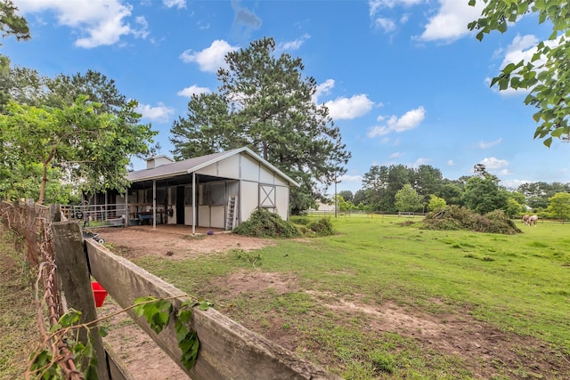 1019 Towering Oaks St, Magnolia, TX 77355 - view of yard featuring an outbuilding, an exterior structure, and a pole building