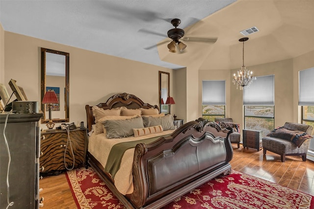 1019 Towering Oaks St, Magnolia, TX 77355 - bedroom featuring wood-type flooring, a chandelier, and ceiling fan