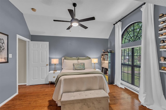 1019 Towering Oaks St, Magnolia, TX 77355 - bedroom with lofted ceiling, wood finished floors, and a ceiling fan