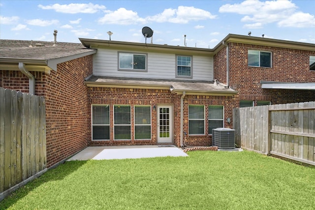 11014 Bakerwood Dr, Houston, TX 77064 - back of property featuring brick siding and a patio