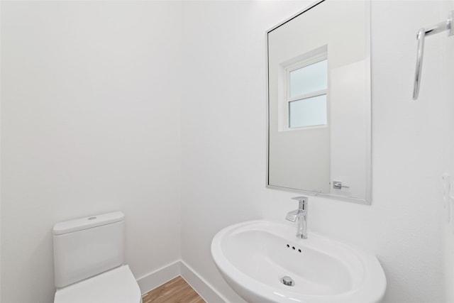2103 Holman, Houston, TX 77004 - bathroom with a sink and wood finished floors