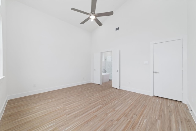 2103 Holman, Houston, TX 77004 - unfurnished bedroom featuring high vaulted ceiling, light wood finished floors, ensuite bathroom, and ceiling fan