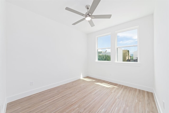 2103 Holman, Houston, TX 77004 - spare room with light wood-type flooring and a ceiling fan