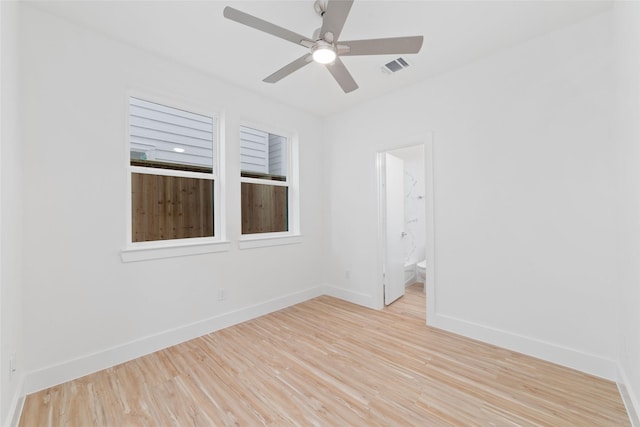 2103 Holman, Houston, TX 77004 - unfurnished room with light wood-type flooring and ceiling fan