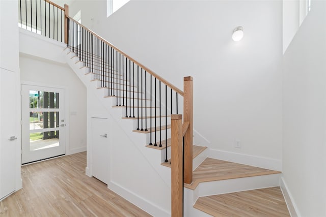 2103 Holman, Houston, TX 77004 - stairs with wood finished floors and a towering ceiling