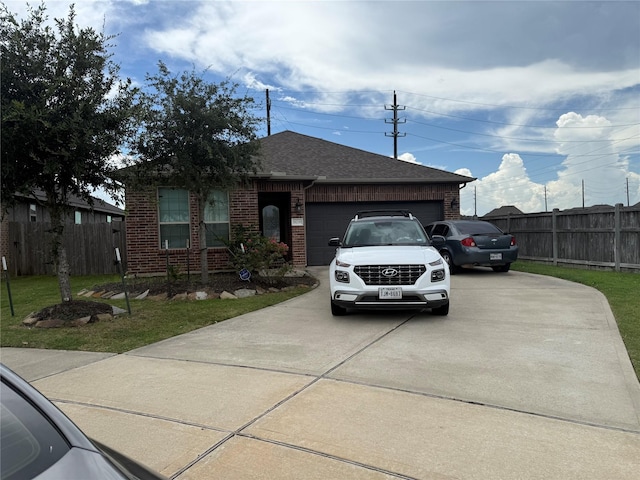 18239 Alora Springs Trce, Cypress, TX 77433 - ranch-style home featuring an attached garage, driveway, brick siding, and a shingled roof