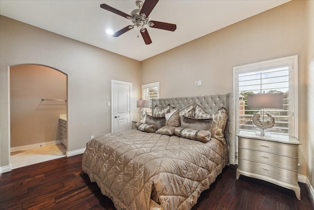 15611 Oyster Cove Dr, Sugar Land, TX 77478 - bedroom featuring wood-type flooring, arched walkways, and ceiling fan