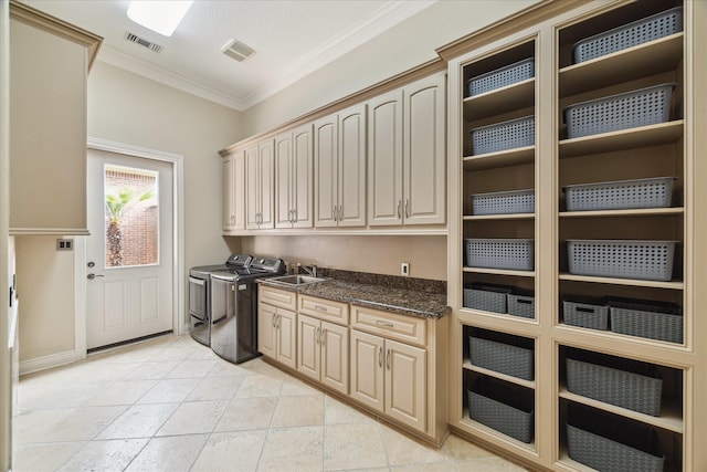 15611 Oyster Cove Dr, Sugar Land, TX 77478 - laundry area featuring cabinet space, washing machine and clothes dryer, and ornamental molding