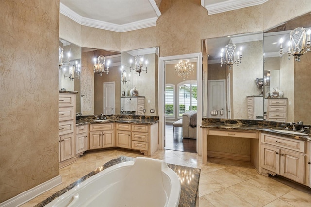 15611 Oyster Cove Dr, Sugar Land, TX 77478 - full bathroom featuring crown molding, a chandelier, a garden tub, two vanities, and a textured wall