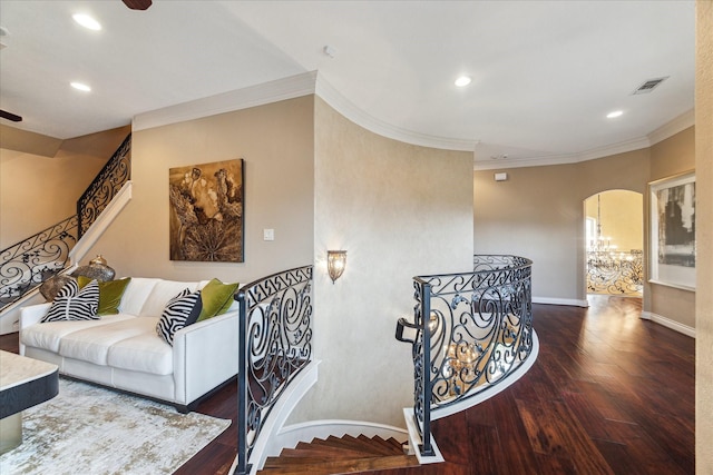 15611 Oyster Cove Dr, Sugar Land, TX 77478 - stairs featuring ornamental molding, recessed lighting, wood finished floors, a ceiling fan, and arched walkways